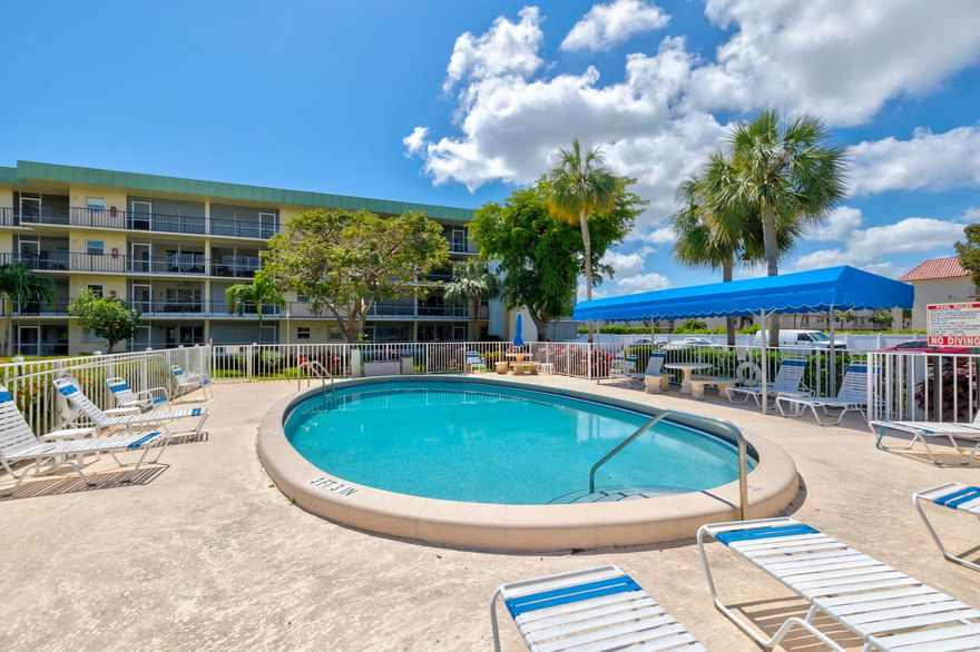 This Vibrant 55+ Community is a Perfect New Home or Winter Getaway! This Rarely Available, Large, Corner Two-Bedroom, Two-Bathroom Condo is Designed for Comfortable and Spacious Living.  Huge enclosed porch , with a Living Dining Combo and a Galley Kitchen with Wood Cabinets & Granite Counters. The Unit is Offered Fully Furnished and has IMPACT Windows. The Community Boasts Two Pools and a Clubhouse, Ideal for Socializing and Relaxation. Great Location Close to Beaches, Shops and Restaurants!