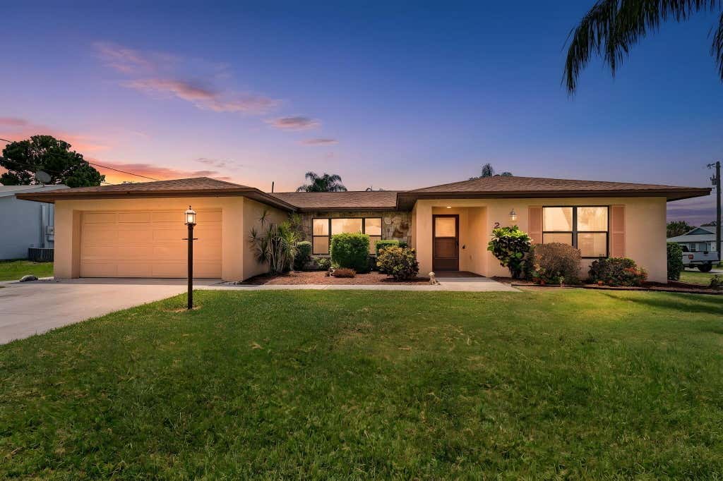 Photo of 2538 SE Hallahan Street, Port Saint Lucie, FL 34952 (MLS # B26041176)