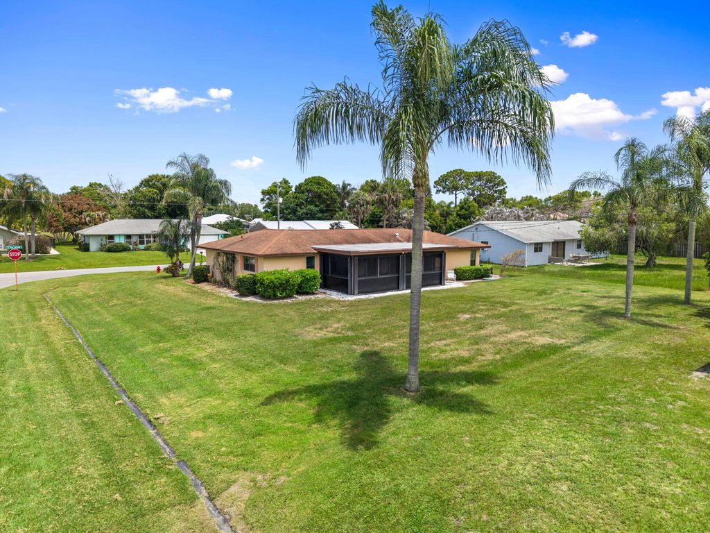 Photo of 2538 SE Hallahan Street, Port Saint Lucie, FL 34952 (MLS # B26041176)