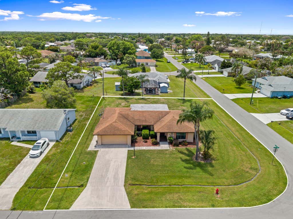 Photo of 2538 SE Hallahan Street, Port Saint Lucie, FL 34952 (MLS # B26041176)