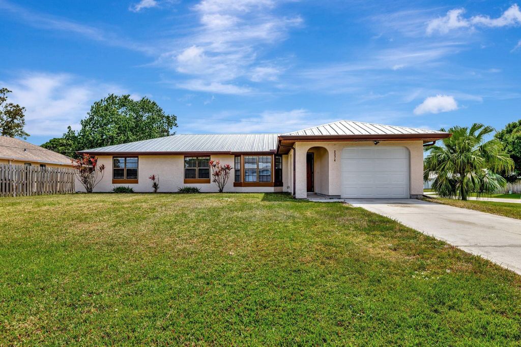 Photo of 2274 SE Seamist Street, Port Saint Lucie, FL 34952 (MLS # R11077401)