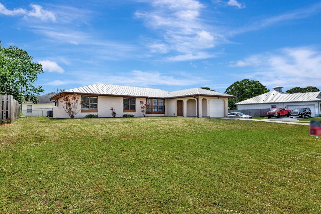 Photo of 2274 SE Seamist Street, Port Saint Lucie, FL 34952 (MLS # R11077401)