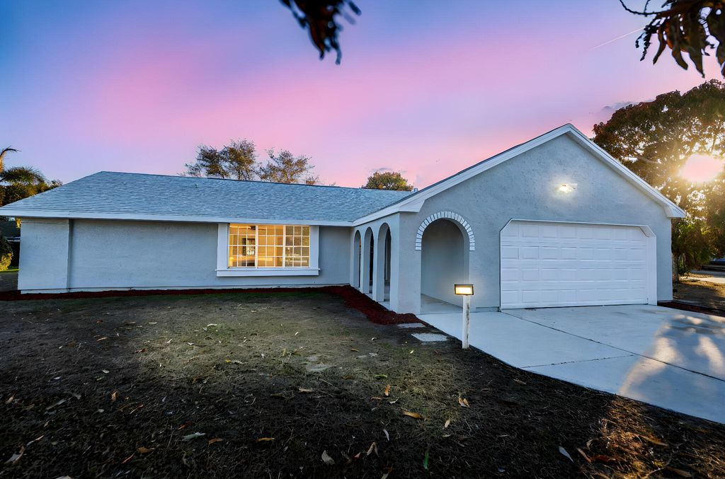 Photo of 1522 SE Hearne Court, Port Saint Lucie, FL 34952 (MLS # R11162648)