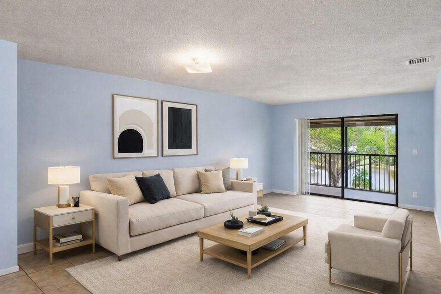 Location, location, location. Waters Edge is an all ages hidden gem in the heart of Coral Springs. Enjoy the breathtaking views of the lake, the pool and the lush tropical landscaping, from your screened balcony on the top floor. Don't worry, there is an elevator. 2 bedrooms and 2 bathrooms, large living and dining area and a washer and dryer in the condo for your convenience. Brand new A/C 2025 and cleaned ducts. Brand new Whirlpool Refrigerator, Stove and Dishwasher 2026. Tile throughout with no carpet! HOA includes water, trash removal, pool and yard maintanence.  Close to the Sawgrass express way, Costco, Crunch Fitness, shopping and entertainment.  Great to live in and investor friendly, as it can be rented right away. Don't miss out, this one won't last. Best price in Waters Edge.