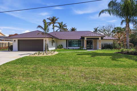 Photo of 1489 SW Pine Tree Lane, Palm City, FL 34990 (MLS # R11154331)