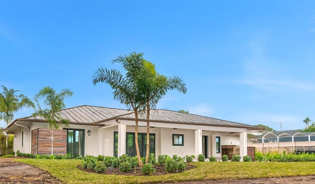 Photo of 1489 SW Pine Tree Lane, Palm City, FL 34990 (MLS # R11154331)