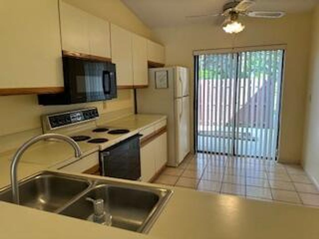 Photo of 3840 Coco Loba Lane, Boynton Beach, FL 33436 (MLS # R11134892)