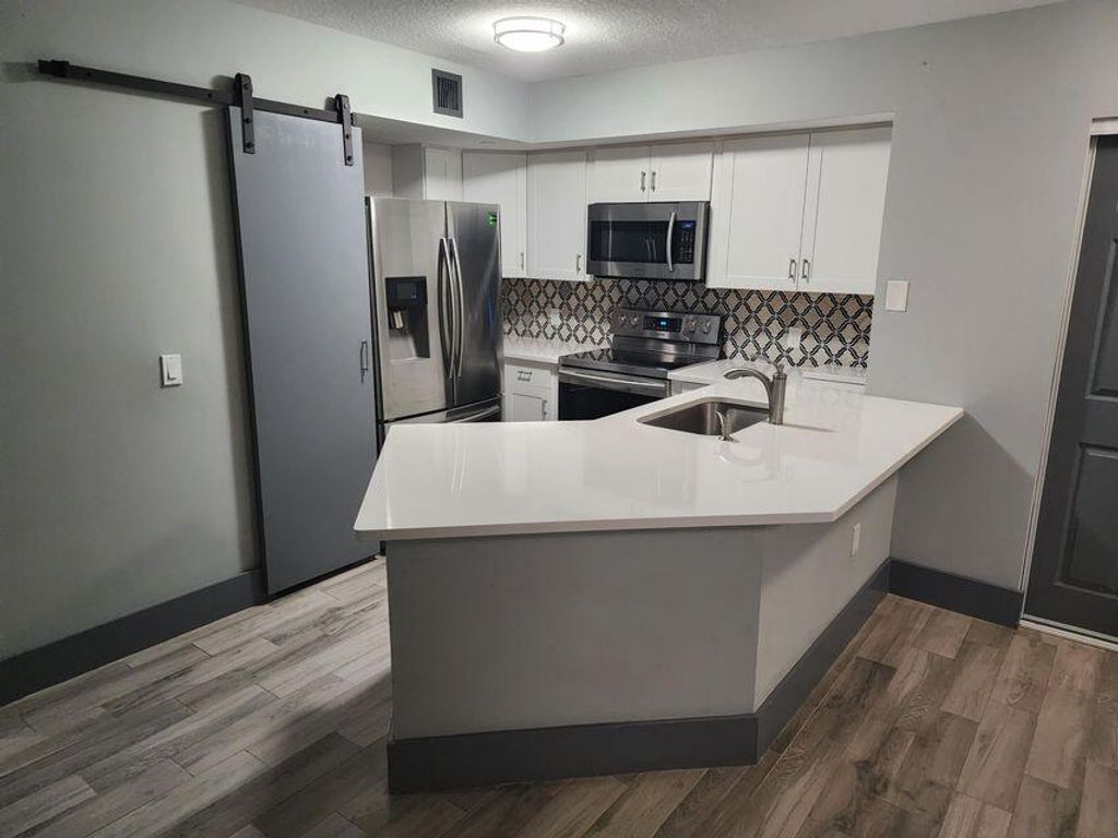 Photo of 4211 San Marino Boulevard #105, West Palm Beach, FL 33409 (MLS # R11156218)