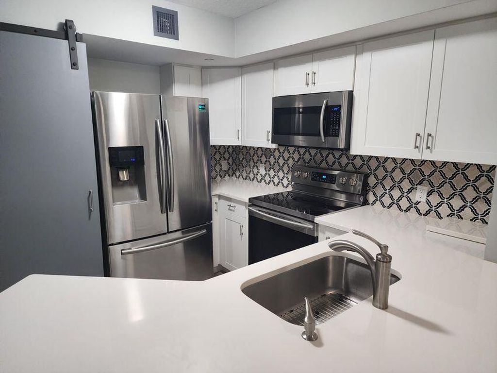 Photo of 4211 San Marino Boulevard #105, West Palm Beach, FL 33409 (MLS # R11156218)