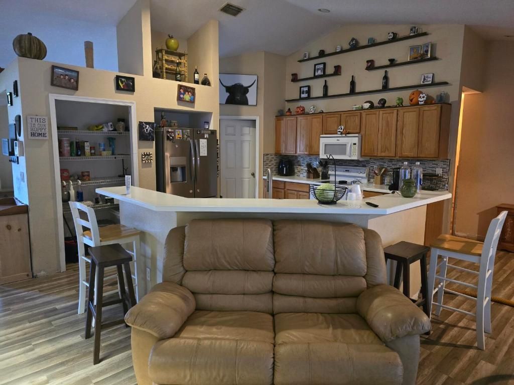 Photo of 1196 SE Puritan Lane, Port Saint Lucie, FL 34983 (MLS # R10990927)