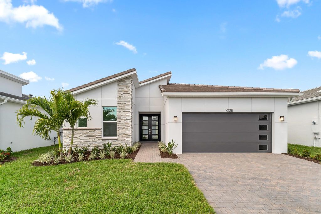 Photo of 10128 SW Carnelian Street, Port Saint Lucie, FL 34987 (MLS # R11087090)