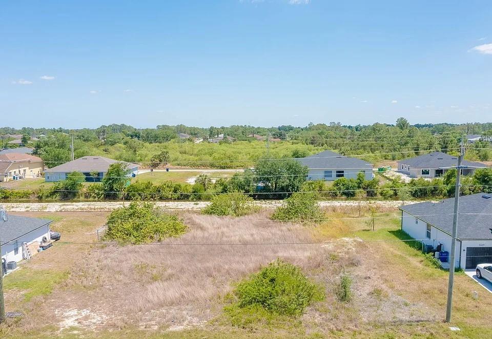 Unique opportunity to own a side-by-side duplex lot totaling 0.28 acres in a fast-developing area of Lehigh Acres. Zoned for residential use with duplex potential, this oversized parcel is ideal for investors or builders looking to develop income-producing property. Located in a quiet neighborhood with easy access to SR-82, I-75, shopping, schools, and dining. Central water and power are nearby. Whether you're looking to build now or hold as an investment, this lot offers strong potential in one of Lee County’s most active markets. Buyer to verify zoning, utility access, and usage with the county.