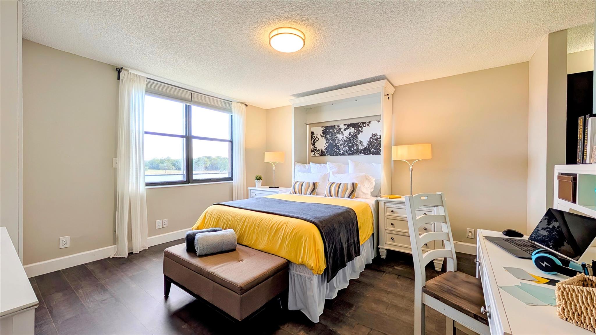 Owner searching for a roommate for 12 month minimum. Schedule your appointment to see this huge and beautifully furnished 300 SqFt master suite with mesmerazing lake view! Living here you will enjoy the Township's resort lifestyle: Two story fitness center, multiple tennis/pickleball/basketball courts, sand volleyball ct, sauna, spa, multiple swimming pools, cinema/theater, billiard room, and more. Rent includes electricity (there is a cap), basic cable TV, internet, water and sewer. The condo is 1,300 sf. Tenant will have the right to use the kitchen and laundry room. Mandatory Association approval can take 3-4 weeks. As per Association: No pets, no motorcycles, no pickup trucks, no RVs, minimum credit score 700. Very peaceful neighborhood, next to the Tradewinds Park and Butterfly World.