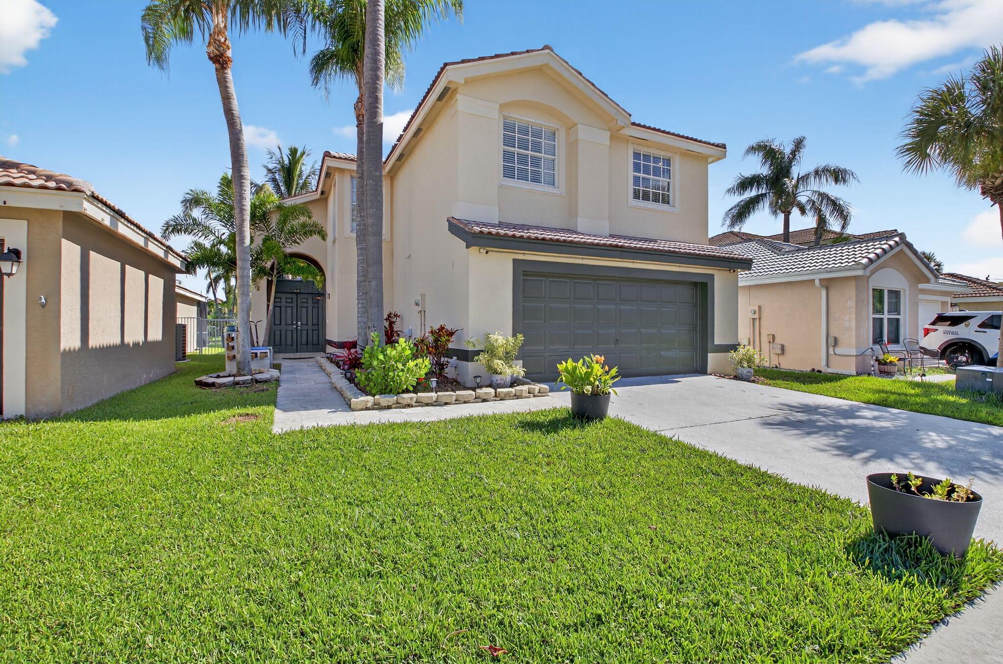 This pristine home, offering both furnished and unfurnished options, features 3 spacious bedrooms, 2.1 baths, and a 2-car garage. Bright, inviting, and impeccably maintained, this home is perfect for both relaxed living and entertaining. The updated open-concept kitchen boasts sleek stainless steel appliances, quartz countertops, and a large peninsula island, seamlessly flowing into the expansive family room and living room -- ideal for hosting guests and enjoying the holidays in style.The staircase leads to the second floor, where you'll find a generously sized master suite complete with a walk-in closet and a master bath featuring dual sinks, a Roman tub, and a separate shower. Two additional well-sized bedrooms and a cozy loft round out the upper level.