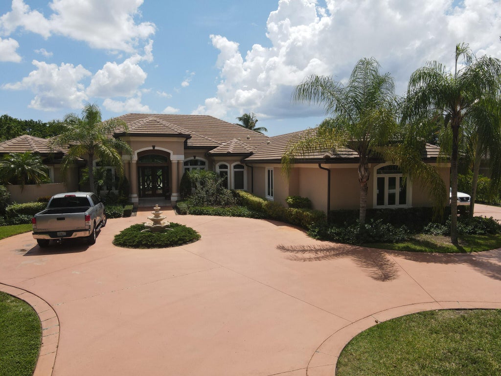 Photo of 8480 MAN O WAR Road, Palm Beach Gardens, FL 33418 (MLS # B26064415)