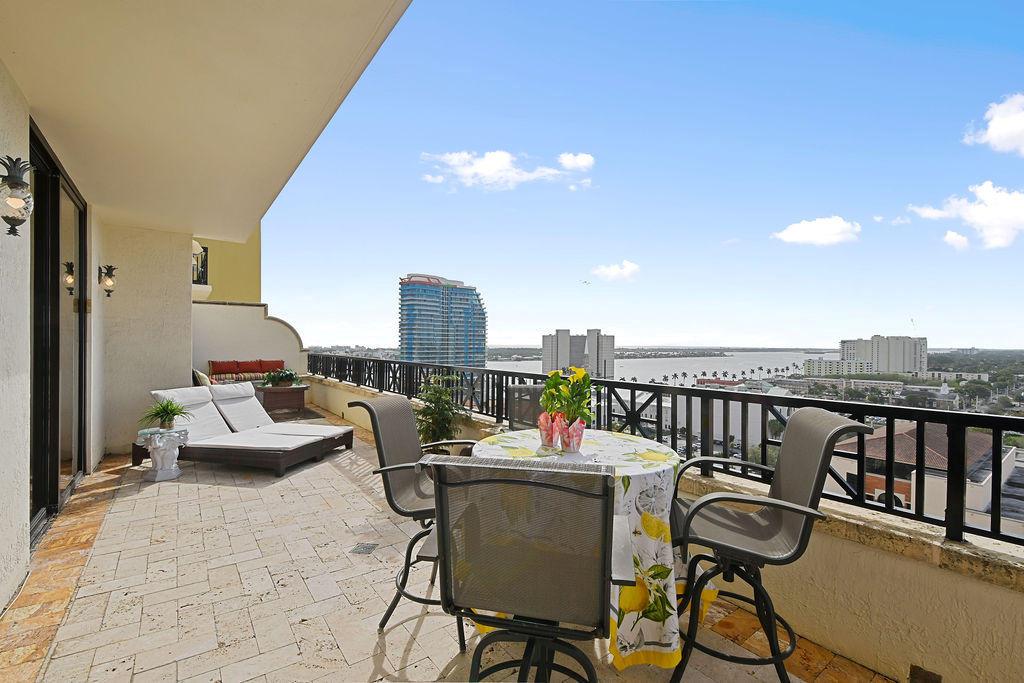 This beautiful apartment magically imbued with panoramic views of the Intracoastal, ocean and Palm Beach from every room. Stunning views of the city, campus, marina and The Bristol. 60' grand terrace for entertaining and enjoying perfect sunrises/sunsets, moonlight and stars. Split floor plan, 2 bedrooms, marble flooring, crown moldings, high ceilings, washer and dryer, new water heather, new A/C, beautifully appointed, close to the elevator. High impact slider doors and windows, Jacuzzi bath...gorgeous...ready for you. One City Plaza, a luxurious building with concierge service, valet parking, 24 hour security, pool and steam room on beautifully landscaped roof top pool, steam room and sauna!BEST VIEWS IN THE BUILDING.