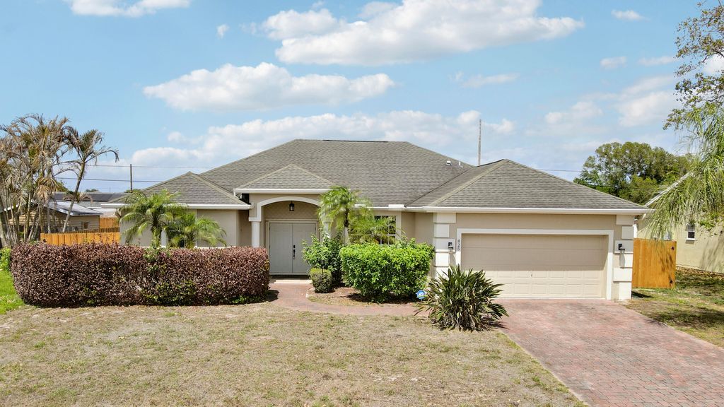 Photo of 825 SW Mccracken Avenue, Port Saint Lucie, FL 34953 (MLS # B26011114)