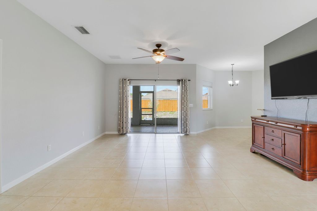 Photo of 825 SW Mccracken Avenue, Port Saint Lucie, FL 34953 (MLS # B26011114)