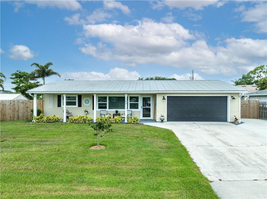 LOVELY, IMPECCABLE NAUTICAL THEME HOME IN THE HEART OF SEBASTIAN. OVERSIZED DRIVEWAY TO ACCOMATE A BOAT OR ADDITIONAL VEHICLE, IMPACT GLASS, METAL ROOF, NEW AC, UPGRADED KITCHEN, NEW SHED WITH ELECTRIC, FENCED BACK YARD, ROOM FOR A POOL AND CONCRETE PAD ADJACENT TO THE SCREENED IN PATIO FOR BBQ AND ADDITIONAL SITTING. A DECORATIVE POND ADDS TO THE CHARM OF THIS COTTAGE HOME. MOVE IN READY, THIS CAN BE A STARTER HOME, RETIREMENT OR VACTION HOME. THE OPTIONS ARE ENDLESS.