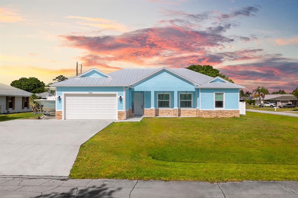 Photo of 704 SW Avens Street, Port St Lucie, FL 34983 (MLS # R10881848)