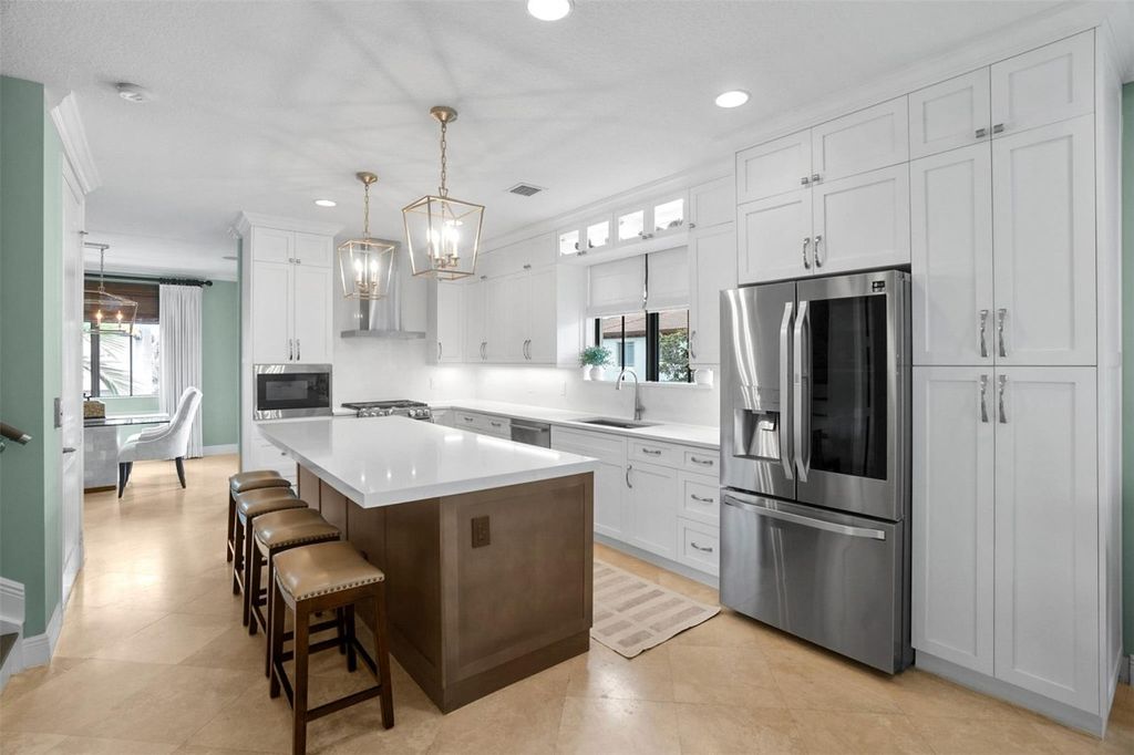 Photo of 72 NW Chaucer Lane, Boca Raton, FL 33432 (MLS # F10545242)