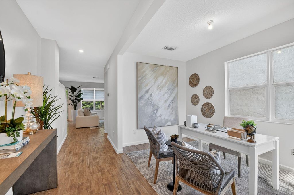 Photo of 6680 Pointe Of Woods Drive, West Palm Beach, FL 33415 (MLS # B26013940)