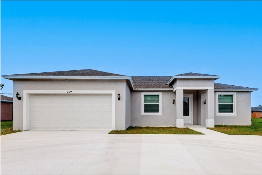 Photo of 229 SW Becker Road, Port Saint Lucie, FL 34953 (MLS # R10930616)