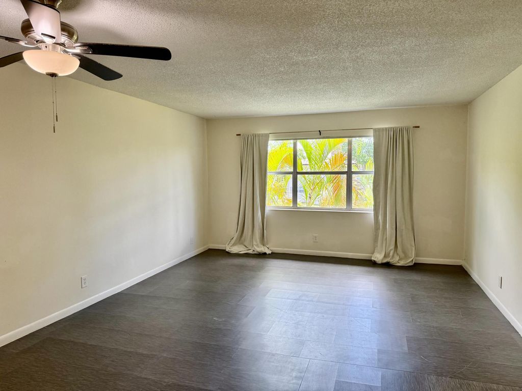 Photo of 560 SE 2nd Avenue, Deerfield Beach, FL 33441 (MLS # B26021968)