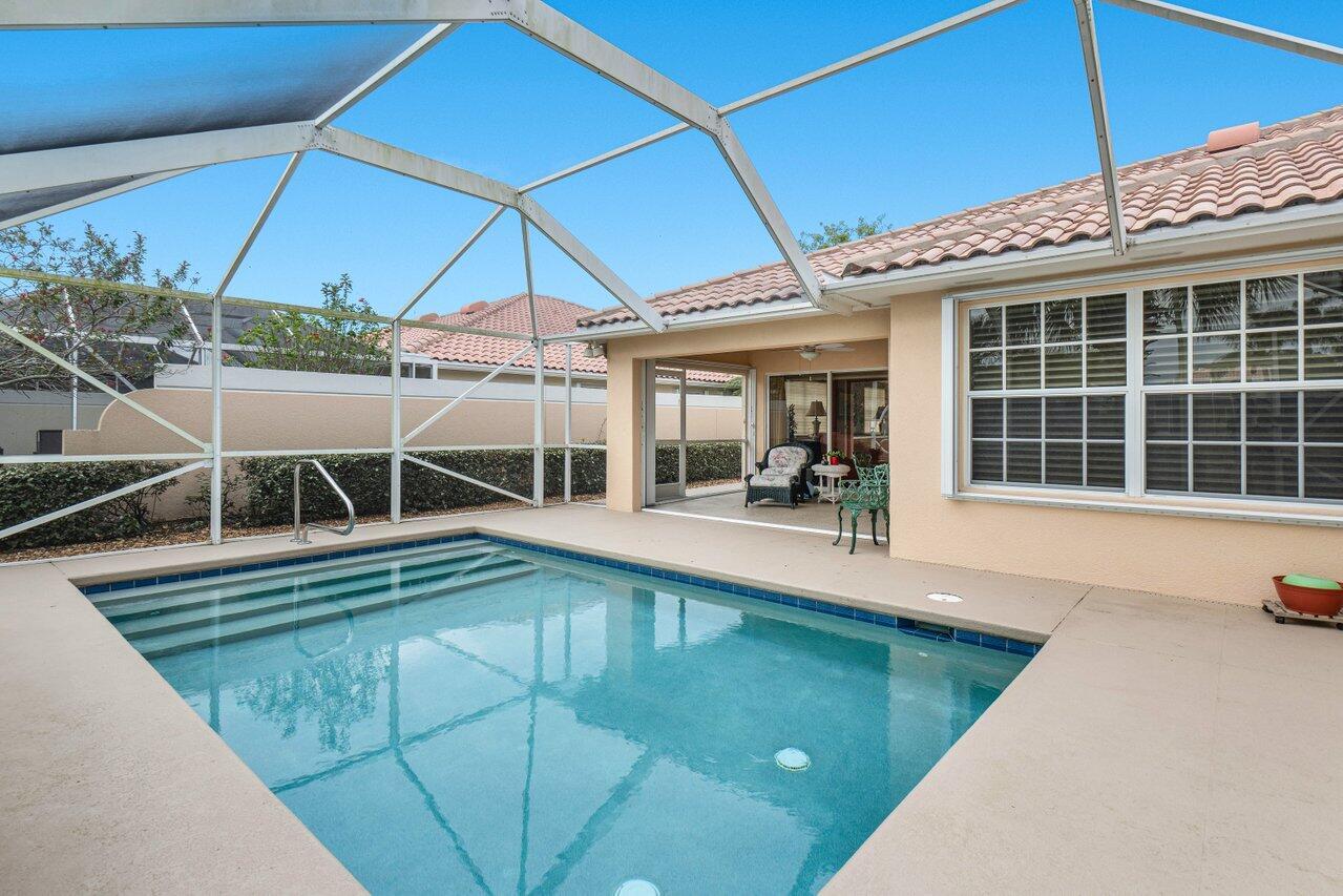 Welcome to Villagewalk. One of the best kept secrets in Wellington. Enjoy a Country Club Atmosphere without the expensive membership dues. This two bedroom two bath Capri Model is the only Capri available at the moment with a private pool. This immaculately kept home offers beautiful water and pool views. All window and doors have accordion shutters offering storm protection and will give you a break with your property insurance premiums. The AC was replaced in 2021, a new pool pump in 2022, New Refrigerator in 2023, New Hot Water Heater in 2023, a new dishwasher in 2023. Truly an opportunity not to be missed.