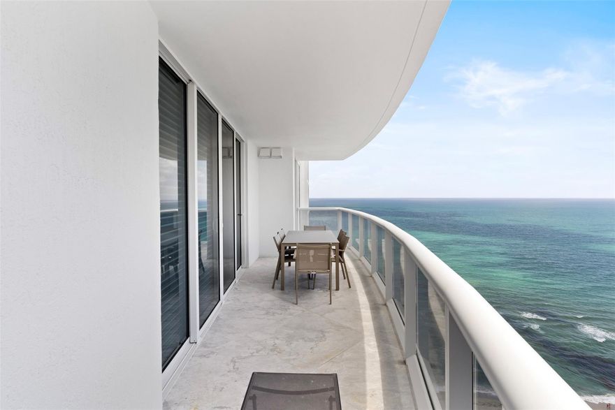 Available for seasonal rental (6-month minimum) or 12 month lease, this partially furnished 2-bedroom, 2-bath condo on the 30th floor of the prestigious Ocean Three building in Sunny Isles Beach offers stunning direct ocean views from every room. Featuring modern vinyl flooring, custom closets, blackout shades in both bedrooms, and a spacious master bath with dual sinks, the unit combines comfort and elegance. Floor-to-ceiling impact windows and sliding doors lead to a large balcony overlooking the ocean. Enjoy resort-style amenities including private beach access, pool and beach service, a gym, tennis courts, spa with jacuzzi and steam/massage rooms, 24-hour security, valet, and a gourmet market. W&D in-unit. Ideally located near Bal Harbour, Aventura Mall, shops, and restaurants.