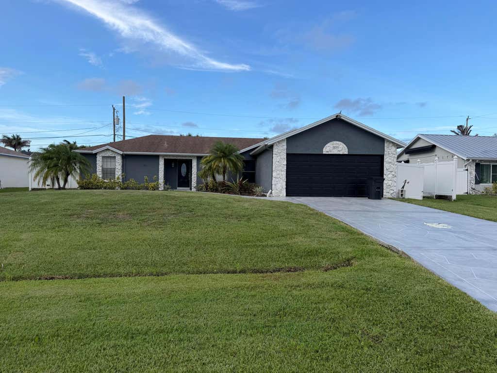 Photo of 2573 SW Import Drive, Port Saint Lucie, FL 34987 (MLS # B26040025)