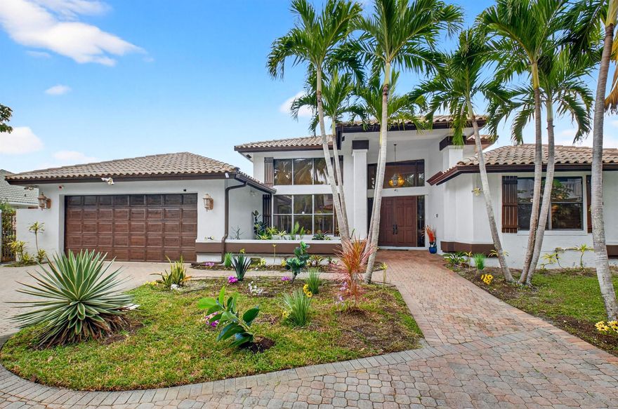 Rarely Available. 4 bedroom 3.5 Bath Custom Estate One Story Pool Home with Stunning Lake Views From Every Room. Over 3,300 sq ft of Living Space on a Private 16,000+ sq ft cul-de-sac. Enjoy Wide Lake Views with no rear neighbors. 100 feet of Dock Space. Private Backyard Perfect for Entertaining. Interior features Include Soaring Ceilings, Split Bedroom Layout with 2 Primary Suites. Boca Sailing & Racquet Club is an Exclusive Gated Community  of 100 custom-built homes, known for its Oversized Lots, Natural Beauty & Central Location in Boca Raton.  24/7 secutiry. Community Amenities include Tennis & Pickleball Courts, a Clubhouse, a 45 acre lake to Kayak, Paddleboard & Fish. A rated schools.  Minutes to Mizner Park, Town Center Mall, I-95, & Boca Raton Beaches.