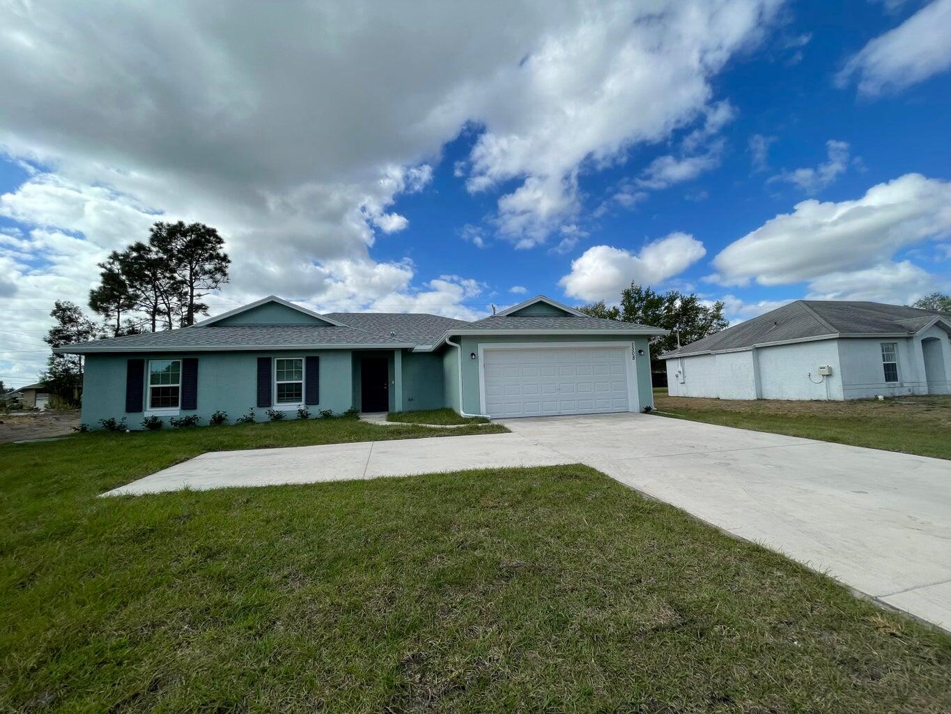 Absolutely Beautiful 4/3/2 Home with 2 Master Suites!!! Built in 2023. Great Location close to shopping, I-95, Doctors. Walking distance to schools. Large 2 Master Bedroom Suites with walk in closets. Large Kitchen Island with wood cabinets. Coffered ceiling in Master Bedroom. Tile Floors in Living, Dining & Kitchen. All Stainless Steel Appliances. Impact Sliding Doors. Covered Porch & Sprinkler System. This home is a must see.