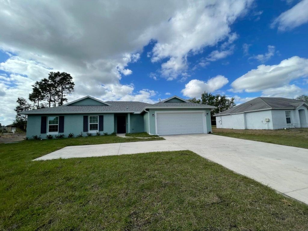 Photo of 1508 SW California Boulevard, Port Saint Lucie, FL 34953 (MLS # R10985171)