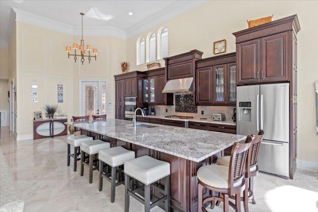 Photo of 304 Alicante Drive, Juno Beach, FL 33408 (MLS # R10940277)