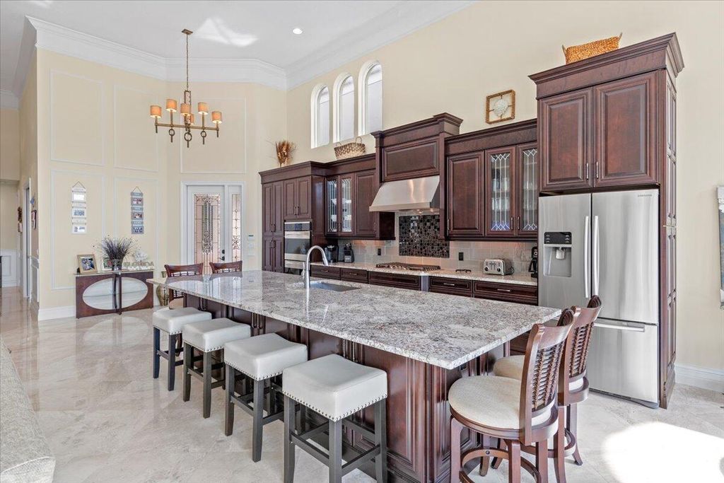Photo of 304 Alicante Drive, Juno Beach, FL 33408 (MLS # R10940277)