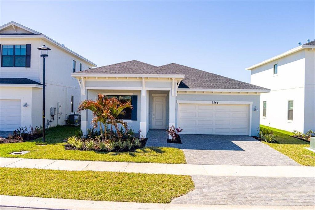 Photo of 6866 NW Kestrel Lane, Port Saint Lucie, FL 34987 (MLS # R11141411)