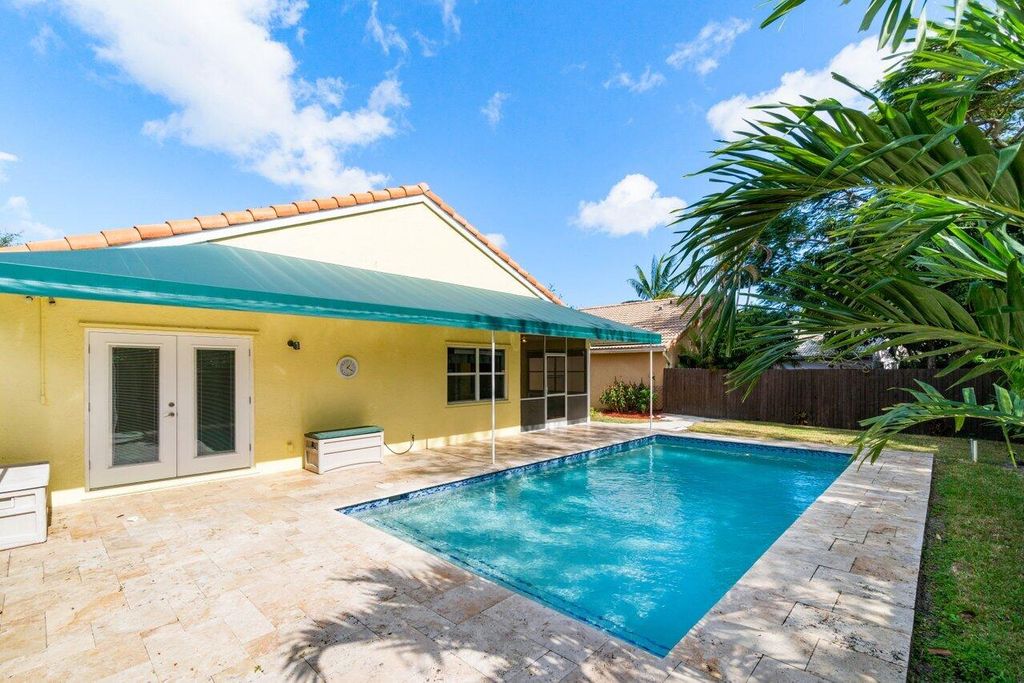 Photo of 4050 Laurelwood Lane, Delray Beach, FL 33445 (MLS # R11042835)