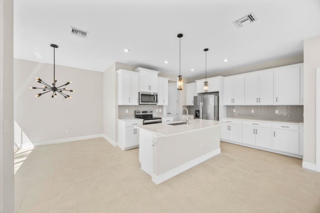 Photo of 3552 NW Solange Court #0, Jensen Beach, FL 34957 (MLS # B26039086)