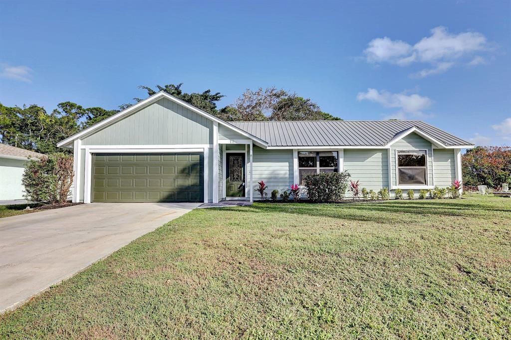 Photo of 154 SE Crosspoint Drive, Port Saint Lucie, FL 34983 (MLS # R10765206)