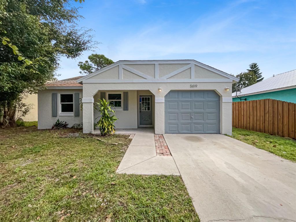 Photo of 5819 SE Wilsie Drive, Stuart, FL 34997 (MLS # R10931882)