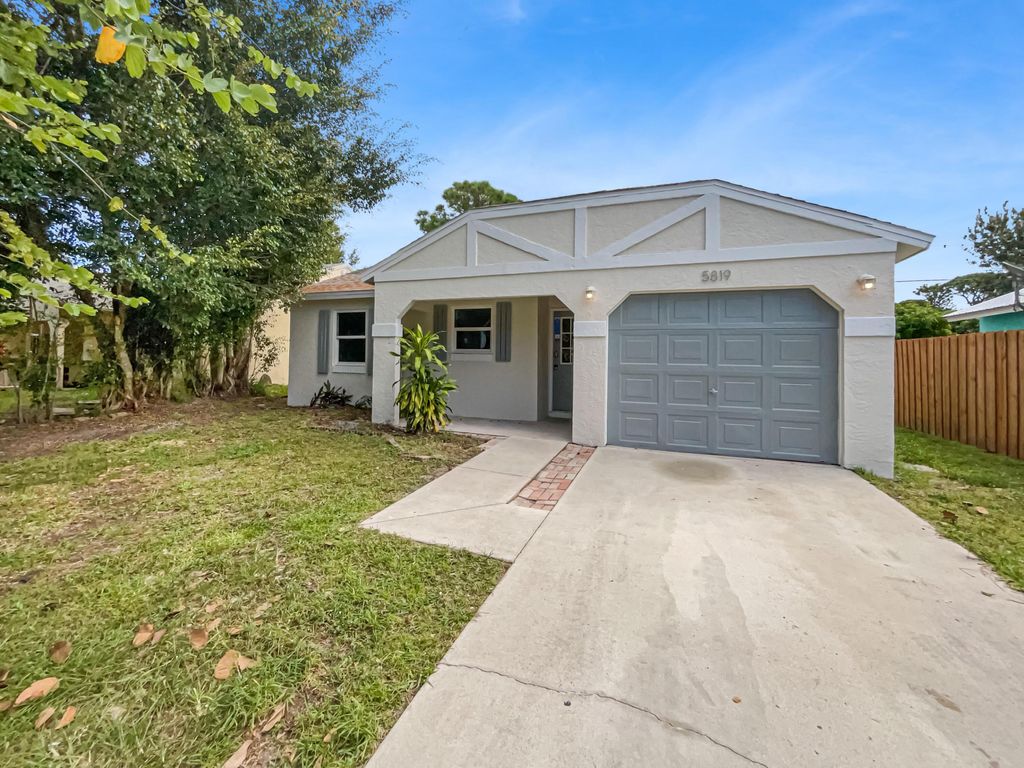 Photo of 5819 SE Wilsie Drive, Stuart, FL 34997 (MLS # R10931882)