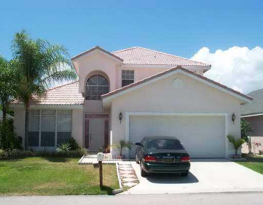 THIS 2 STORY DETACHED HOME IS BUILT IN 1994 AND HAS 4 BEDROOMS AND 2.5 BATHS. MASTER BEDROON ON DOWN STAIR,FORMAL LIVING AND DINING ROOM COMBINATION,FAMILY ROOM,EAT IN KITCHEN, BREAKFAST BAR LARGE FOYER, LOFT OR 4TH BEDROOM, CEILING FANS, CATHEDRAL VAULTED CEILINGS, WALK IN CLOSETS, 2 CAR GARAGE, COMMUNITY SWIMMING POOL,SPA,TENNIS,CHILDRENS PLAY AREA, CLUBHOUSE THE BUILDING LOT IS FENCED AND HAS BEAUTIFUL LANDSCAPING. ''BEING SOLD 'AS IS' CERAMIC FLOOR TILES, SCREENED PATIO, CARPETS,'' AUTOMATIC GARAGE OPENER, S-TILE ROOF. SOLD UNFURNISHED..LISTING IS SUBJECT TO ERRORS AND OMISSIONS