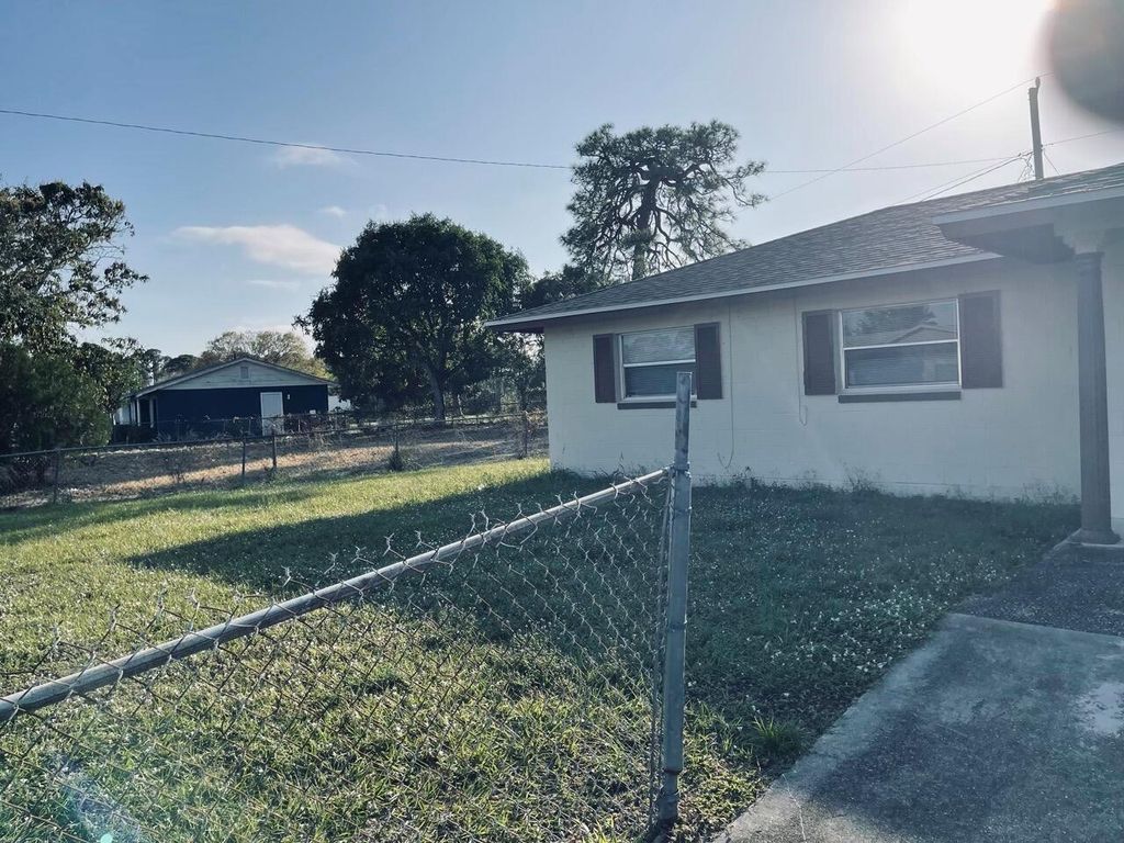 Photo of 108 Hilton Drive, Fort Pierce, FL 34946 (MLS # R11063658)