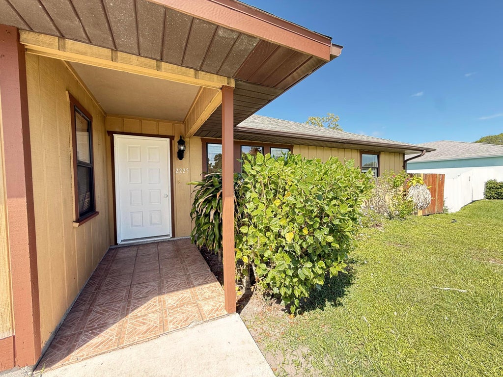 Photo of 2225 SE MELALEUCA Boulevard, Port Saint Lucie, FL 34952 (MLS # B26080810)