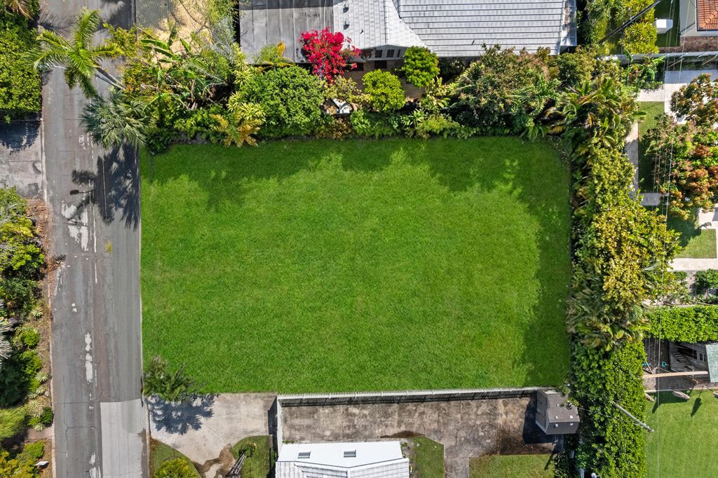 Photo of 310 Russlyn Drive, West Palm Beach, FL 33405 (MLS # B26009874)