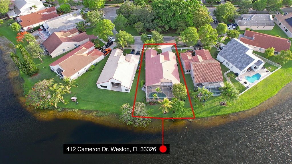 Photo of 412 Cameron Drive, Weston, FL 33326 (MLS # B26029765)