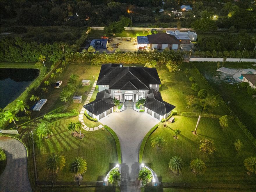 ***NEWLY BUILT IN 2021,THIS MODERN CONTEMPORARY ESTATE IS LOCATED IN THE HEART OF SUNSHINE RANCHES!!!***BOLD AND STATELY ON NEARLY 2 ACRES,THIS SECLUDED ENCLAVE OF ONLY 3 HOMES IS TUCKED AWAY & HIDDEN W/I PLAIN SITE. TOTALING 10,695 SF,MAIN LIVING AREA 7,560 SF,OFFERS 6 BEDRMS+OFFICE,7.5 BATHS,W/4 CAR GARAGE. CONTROL 4 SMART HOME W/ACCESS FROM YOUR PHONE. TWO-STORY TRIPLE SPLIT FLR PLAN W/IMPRESSIVE RMS SIZES &THREE BONUS RMS FOR THE FULL FAMILY EXPERIENCE. DESIGNER MODERN KITCHEN W/ S/S STEEL APPLIANCE PACKAGE,WALK-IN PANTRY,EXTRA CABINETS,QUARTZ COUNTERS. GRAND FOYER ENTRY W/SOARING 24' COFFER &DECORATIVE CEILINGS,CROWN MOLDING,ACCENT LIGHTING,LED LIGHTS THRU-OUT. 4’X2' MARBLE FLING IN SOCIAL AREAS &WOOD FLRS IN ALL BEDRMS. RESORT STYLE 40’X40’ HEATED, SALT POOL W/JACUZZI &TANNING SHELF.