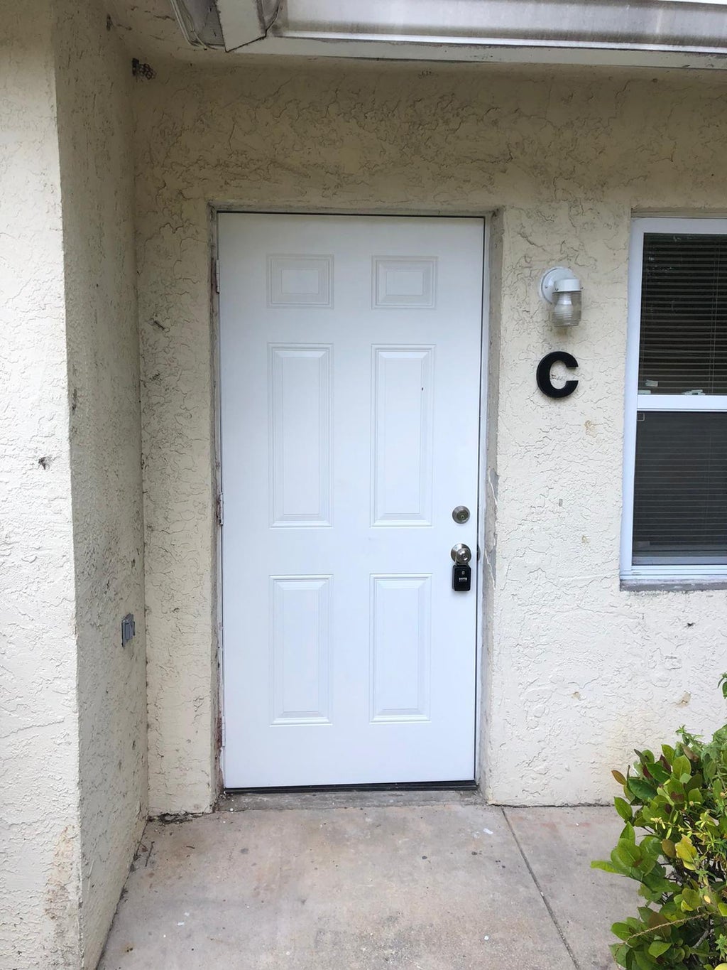 Photo of 5060 Sanctuary Way #C, West Palm Beach, FL 33417 (MLS # R11090044)