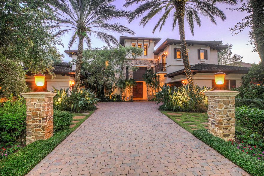 Location Location Location - This home has one of the best wide water views in Admirals Cove.Surround yourself in luxury in this one of a kind home, it boasts waterfall walls, disappearing sliding doors, clean lines, extensive use of marble/stone and warm woods, Zen garden with rock walls and water features, babbling brooks & lush tropical landscaping. The moment you walk inside you are enveloped by soothing sights and sounds.Open granite chef's kitchen w/breakfast & bar seating. 2 story wood paneled office overlooking the wide water. Infinity pool & hot tub, stone summer kitchen are just a few of the many features. The master suite is second to none with serene views of the waterway and bird sanctuary. Lavish master bath with white marble & wood, his/hers water closets & vanities, spa tub